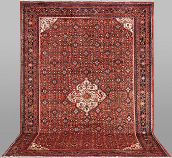 A carpet, Hosseinabad, approx. 320 x 210 cm.