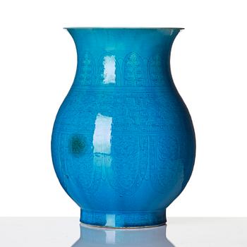 A turquoise glazed vase, zun, Qing dynasty with a Qianlong incised seal mark and of the period.