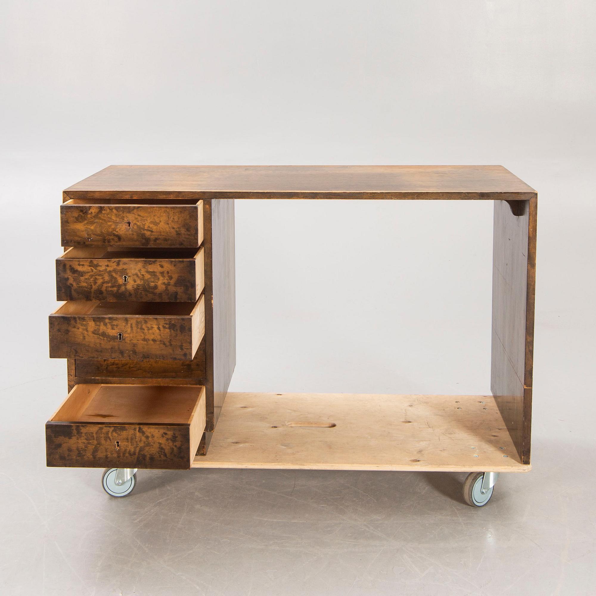 A 1930s birch desk.