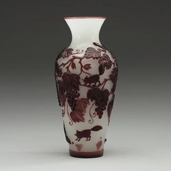 A Chinese purple overlay peking glass vase, 20th Century.