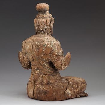 A wooden sculpture of a seated Bodhisattva, presumably Ming dynasty (1368-1644).