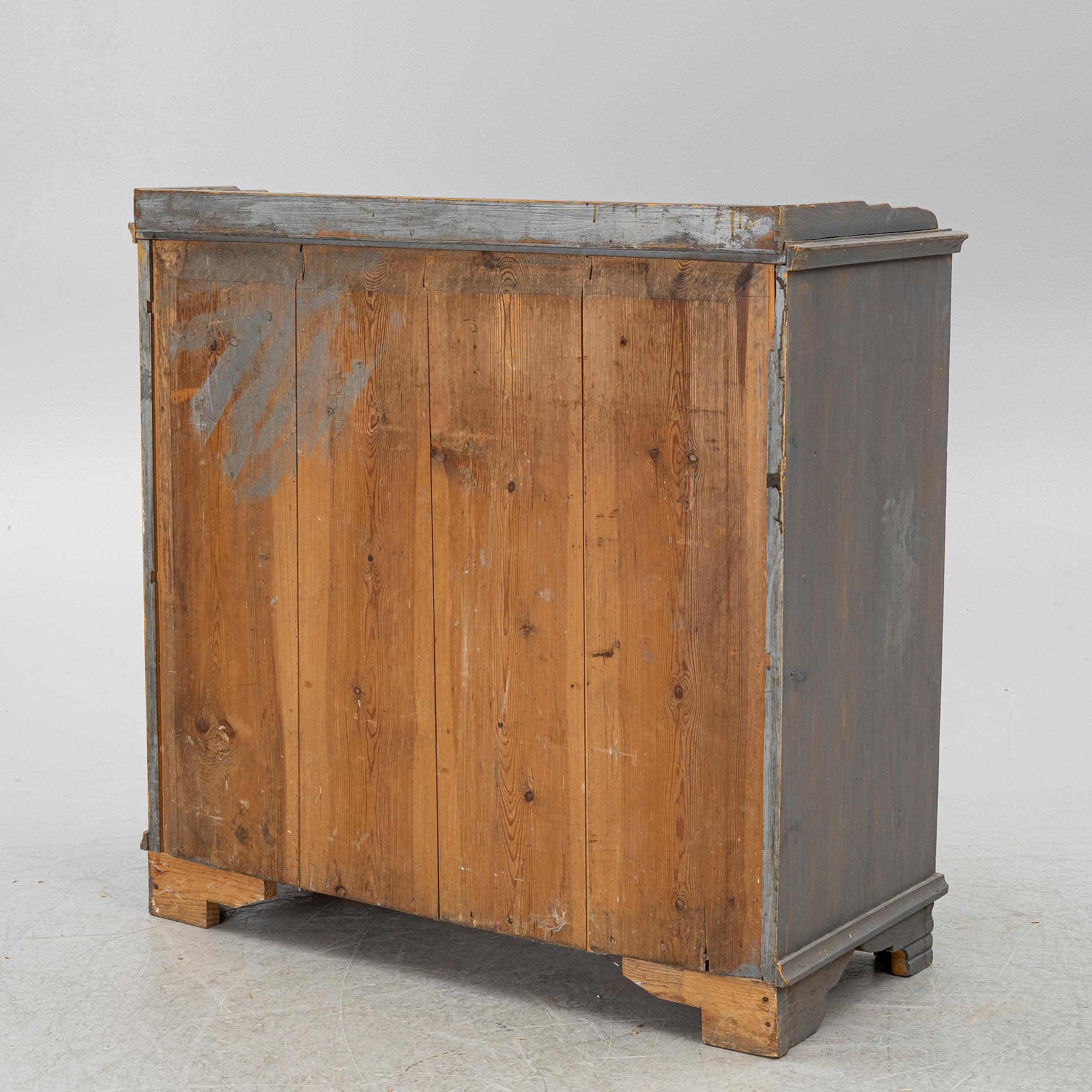 A Gustavian cupboard, circa 1800.