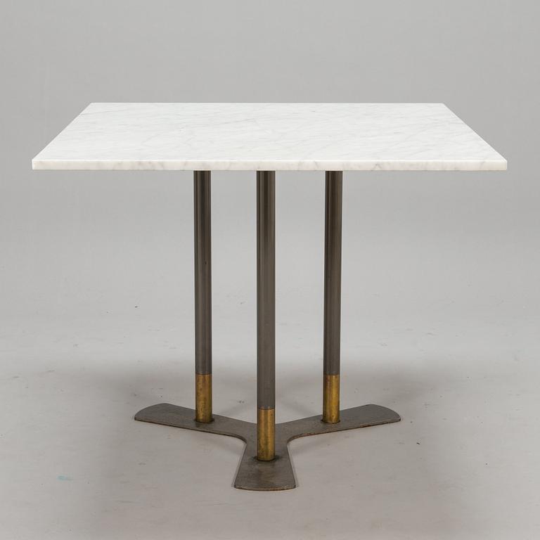 A marble top table, 21th century.