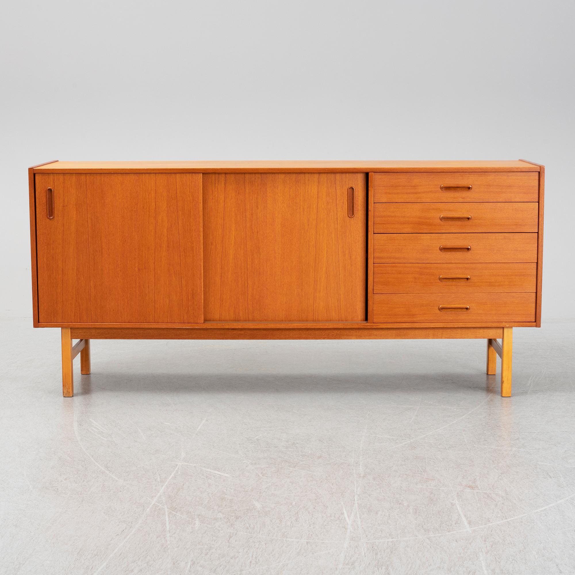 A second half of the 20th century teak veneered sideboard.
