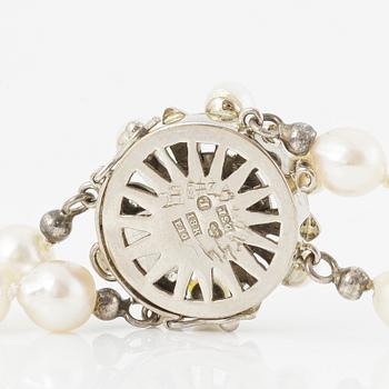 Necklace, cultured pearls, clasp 18K gold with cultured pearls and diamonds, JSG, Jönköping 1979.