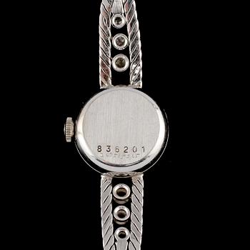 DAMARMBANDSUR, Certina, 18k vitguld med 6 briljantslipade diamanter, omkring 1900-talets mitt. Vikt 19 g.