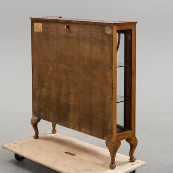 A 20th century English typ cabinet.