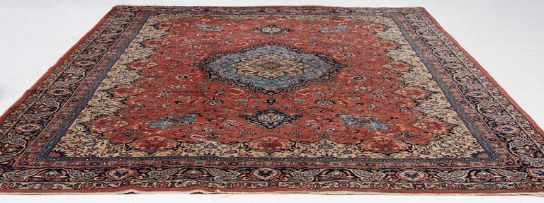 An oriental carpet, c. 370 x 275 cm.