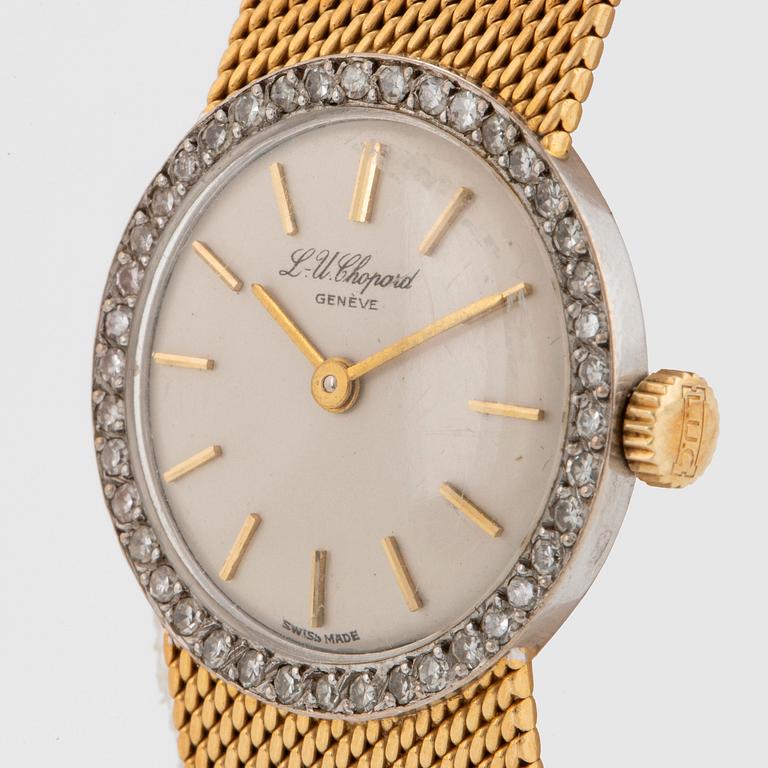 A Chopard wrist watch in 18K gold set with eight-cut diamonds.