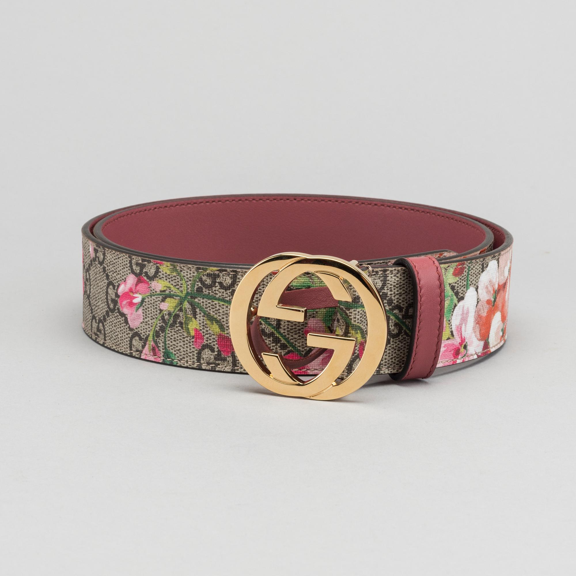 A Gucci blooms belt.