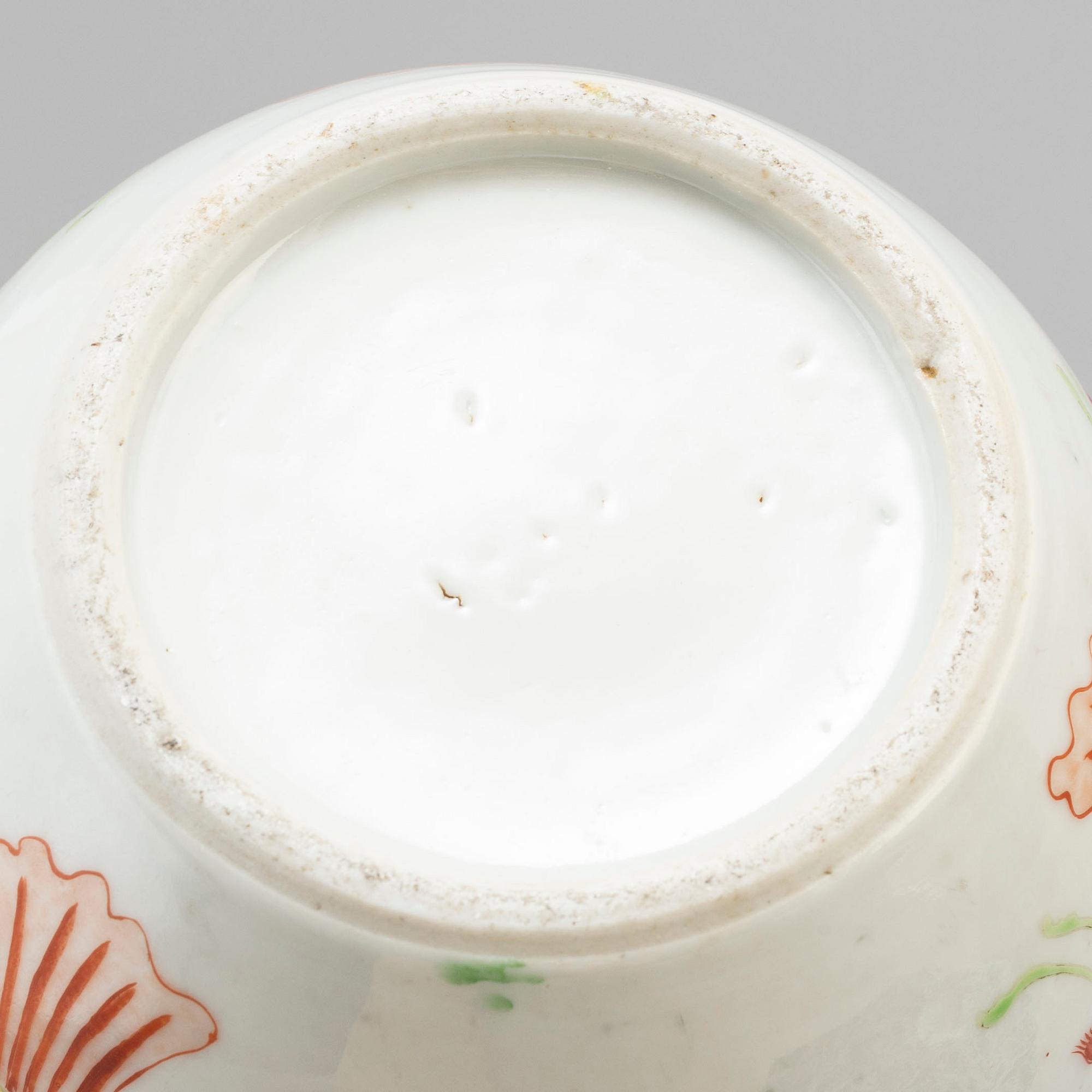 A famille rose trumpet vase, a jar with cover, Qing dynasty, 18th century.