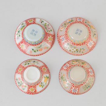 Two chinese peking glass wedding cups with cover and dishes, 20th century, with Qianlongs mark to the base.