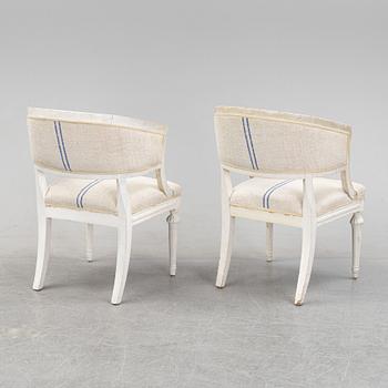 A pair of Gustavian style armchairs from around year 1900.