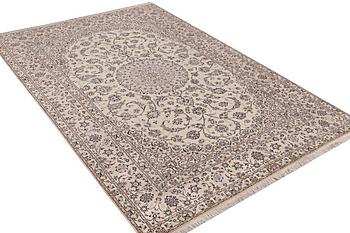 A carpet, Nain, part silk, 6 laa, ca 316 x 210 cm.