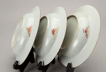 A set of four Chinese famille rose Qianlong porcelain plates.