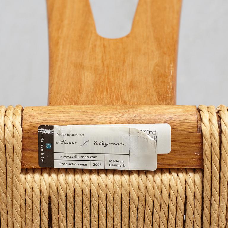 A set of four + two armchairs 'Y-chair' by Hans J Wegner, Carl Hansen & Son, Denmark.