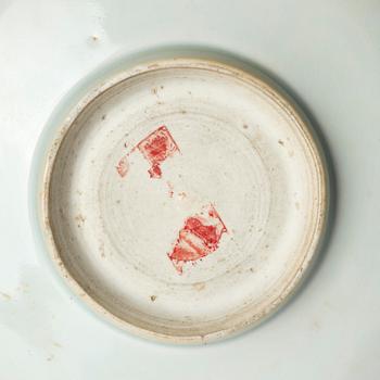 A carved qingbai foliate bowl, Song dynasty (960-1279).