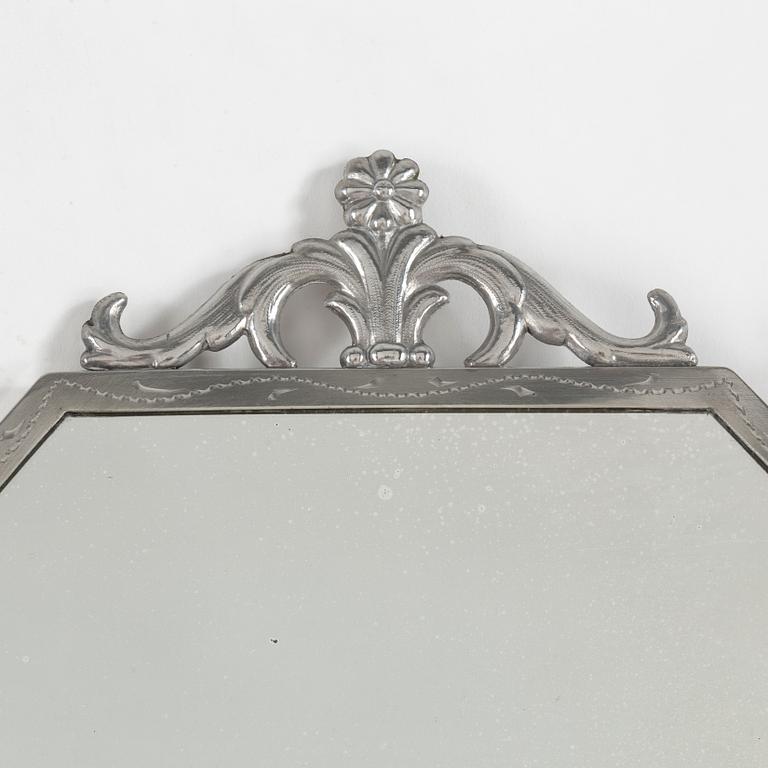 A 1920's/30's pewter mirror.