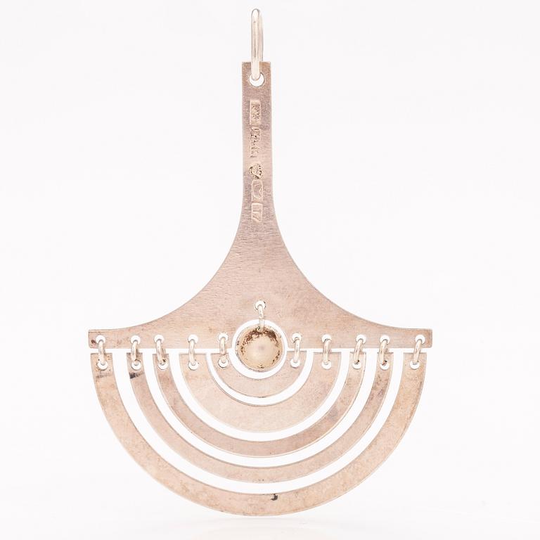 TAPIO WIRKKALA, A sterling silver pendant "Kuunsirppi", Westerback 1972.