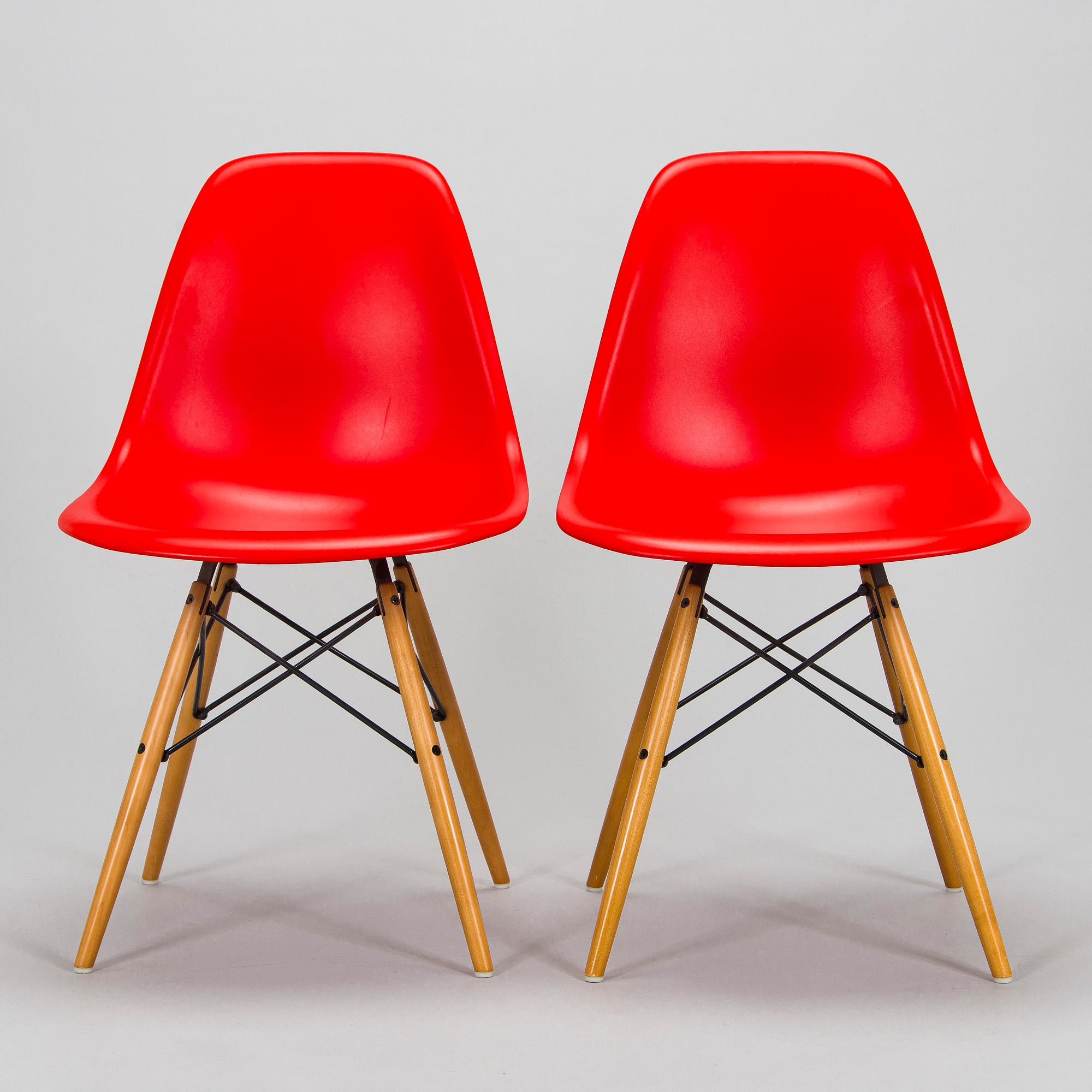 Charles & Ray Eames, two 'Plastic Chair DSW' chairs, Vitra.