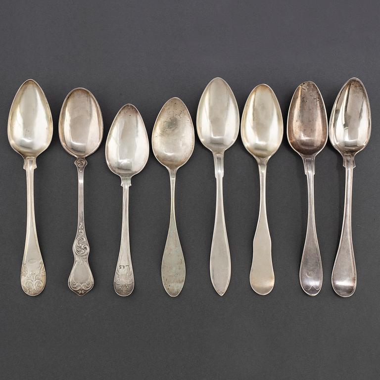 Nineteen 18th, 19th and 20th  Century silver table spoons.