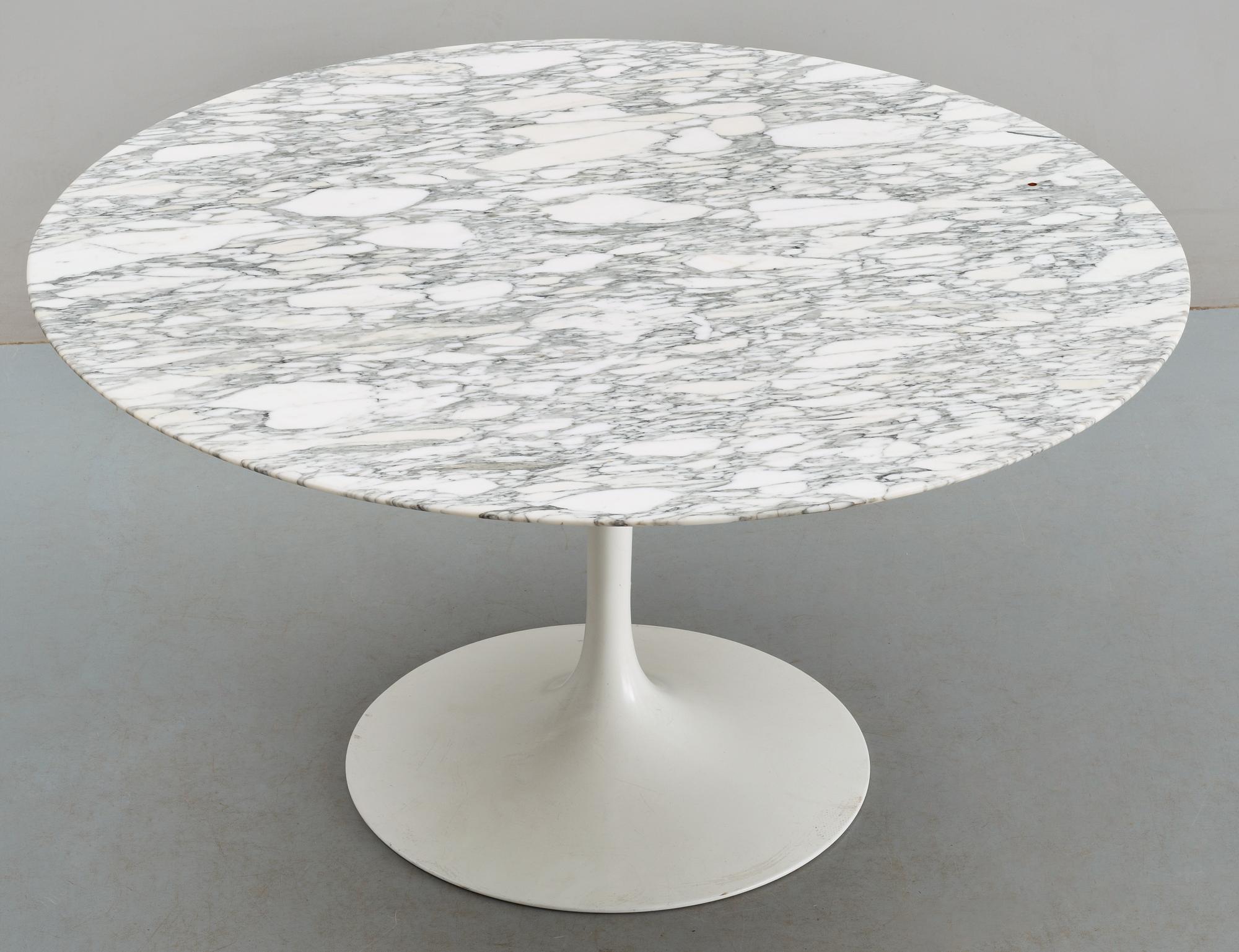 An Eero Saarinen 'Tulip' marble top dinner table, Knoll International, USA.