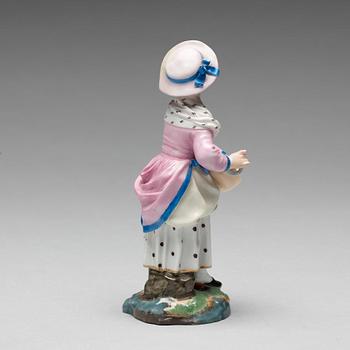 A porcelainfigure of a female musician, "Höchst mark", circa 1900.