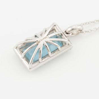 Pendant with chain in 18K gold set with a faceted aquamarine and round brilliant-cut diamonds.
