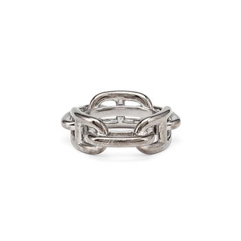 HERMÈS, a silver colored scarf buckle.