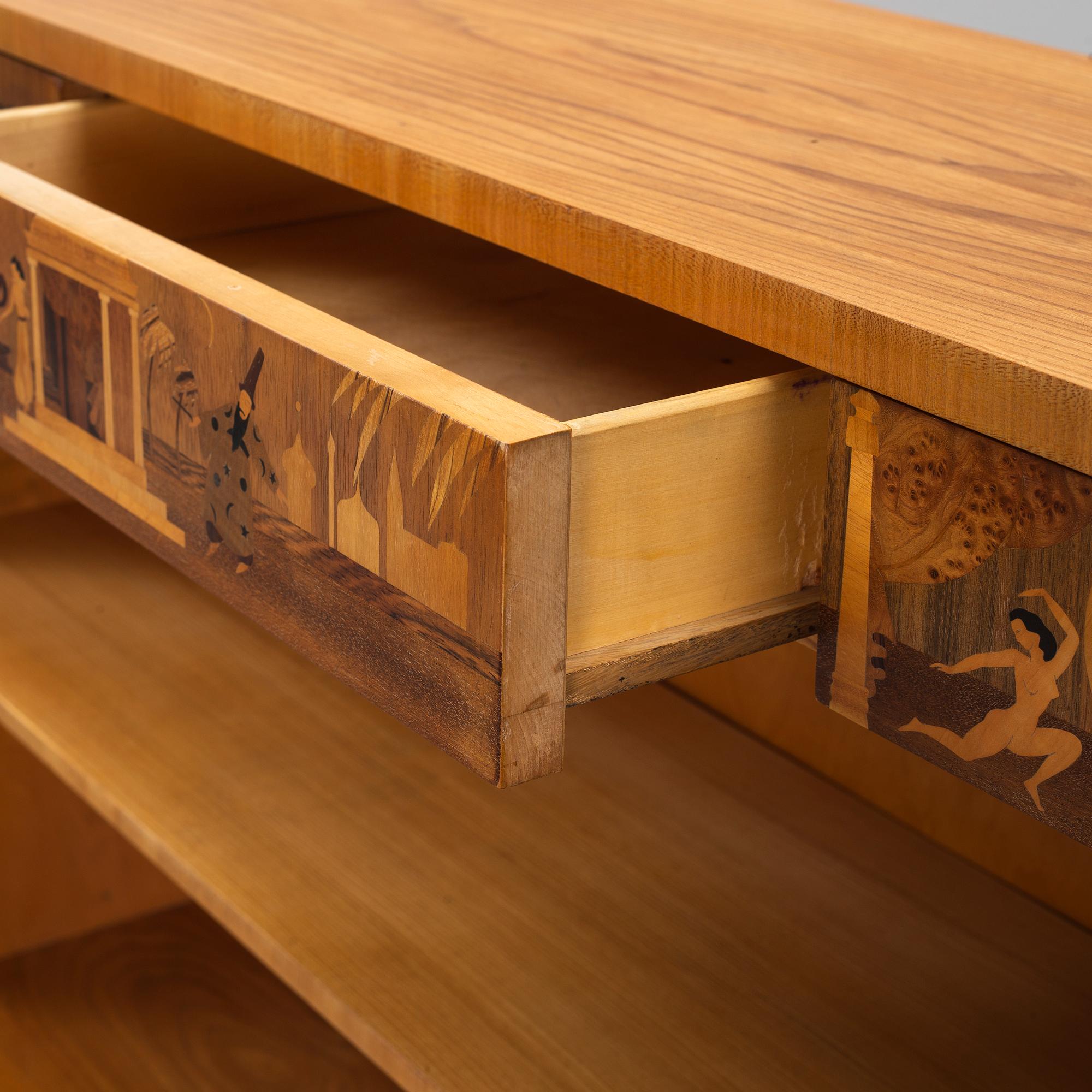 An inlaid bookcase from Mjölby Intarsia, 1930's.