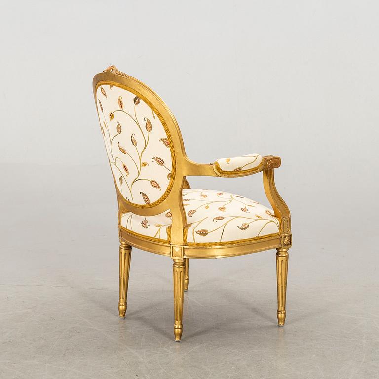 A Gustavian style armchair, 20th century.