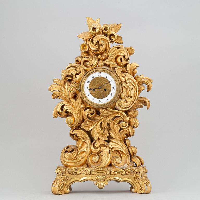 A rococo style table clock, 19th Century.