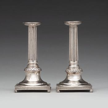 211A. A pair of Swedish early 19th century silver candlesticks, mark of Anders Fornholm, Stockholm 1801.