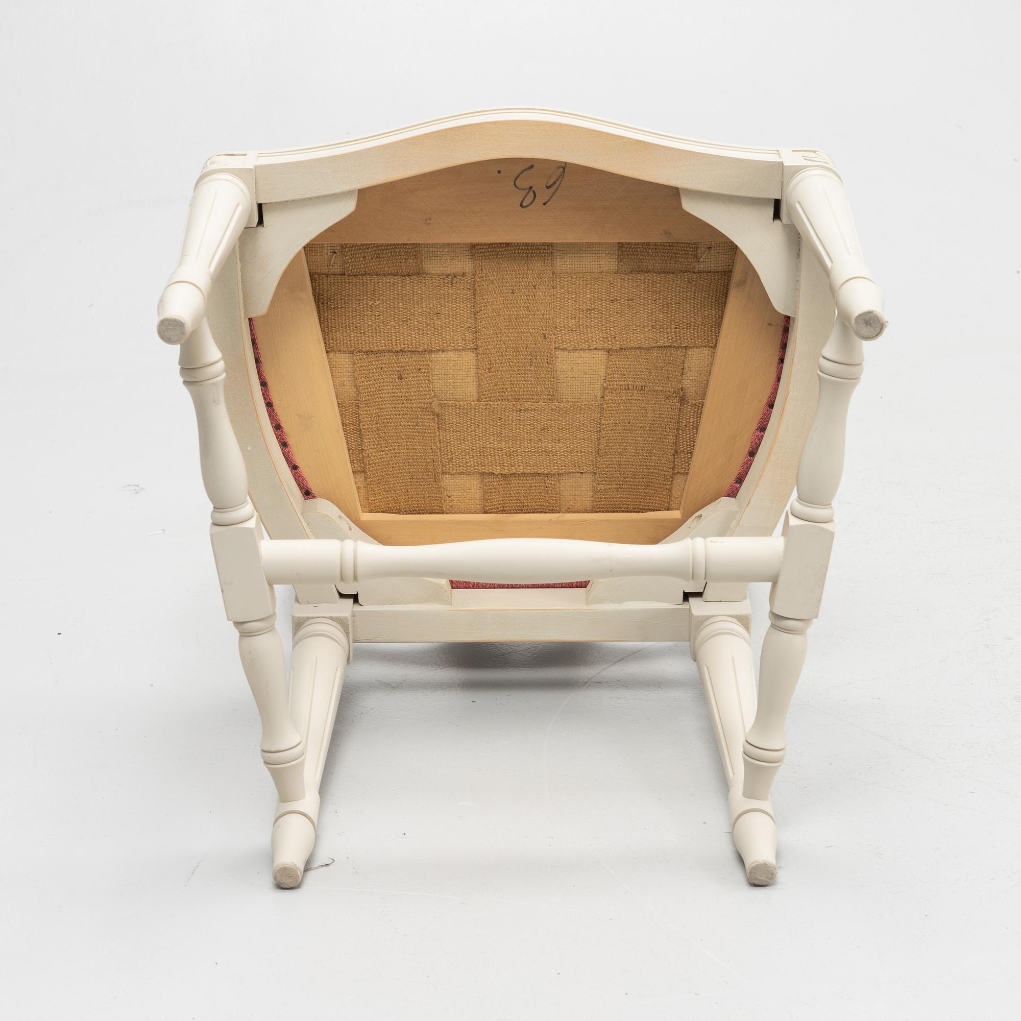 A Gustavian style table with four chairs, second half of the 20th century.
