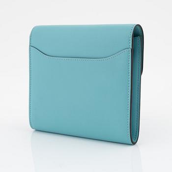 Hermès, a blue leather 'Constance' wallet.