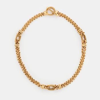 472. An 18K gold necklace retailed by WA Bolin.