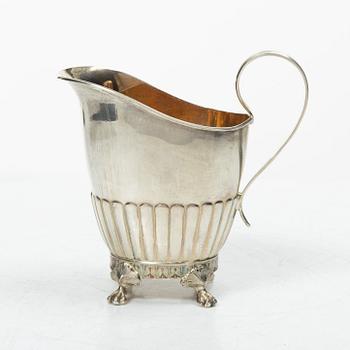 A Swedish silver coffee pot, cream jug and sugar box, Gustavian style, mark of AG Dufva, Stockholm 1911-1912.