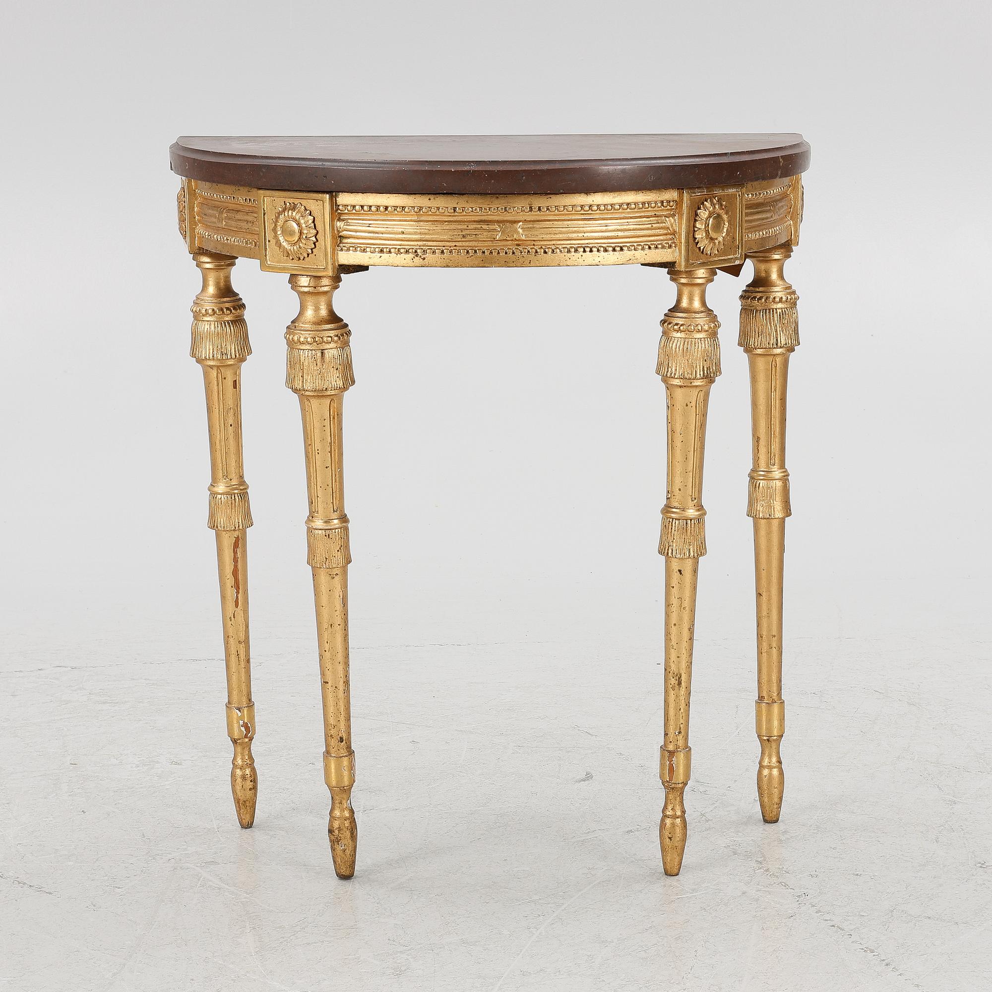 A Gustavian giltwood console table, late 18th century.