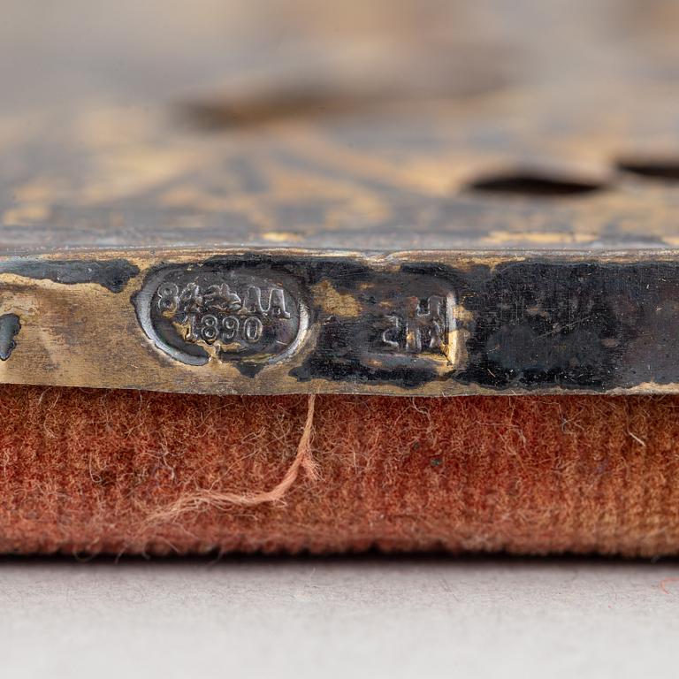 Two Russian 19th century travle icon, oklad in silver and parce-gilt, one with assayer mark AA 1890.