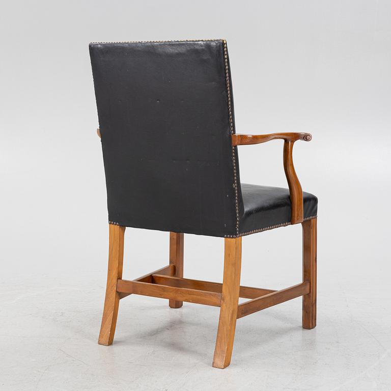 A leather upholstered armchair, 20th Century.