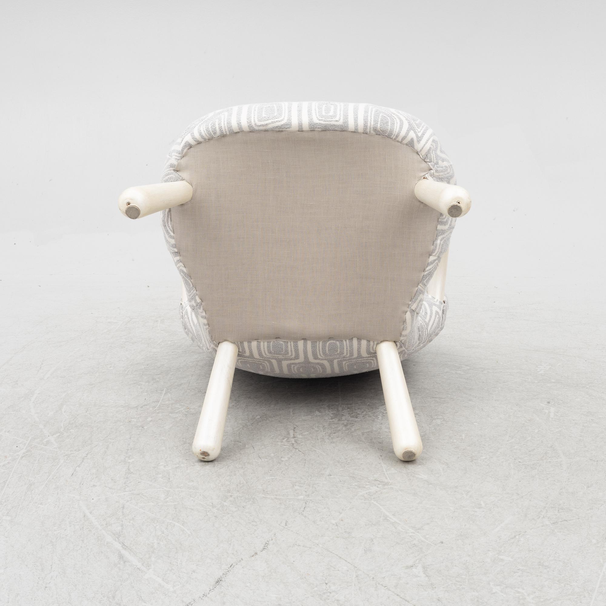 An armchair, 'Muslingestolen' or 'Clam Chair', Scandinavian Modern, mid-20th Century.