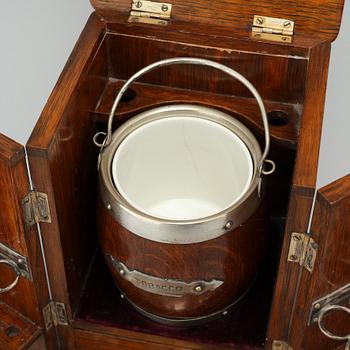 A small tobacco cabinet by BW & Co, early 20th century.