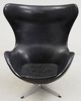 An Arne Jacobsen black leather 'Egg' chair, Fritz Hansen, Denmark 1960's.