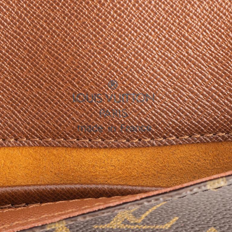 Louis Vuitton, a monogram canvas handbag, 'Musette Tango Short Strap', 2001.
