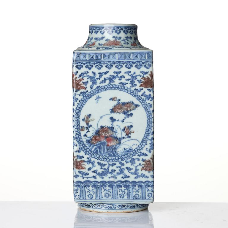An underglaze blue and copper-red 'crane and deer' cong vase, Qing dynasty, 18/19th century.