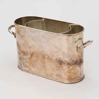 A WHITE METAL DOUBLE COOLER.