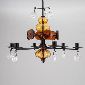 ERIK HÖGLUND, a cast iron and glass chandelier, Boda Smide.