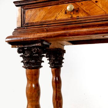 A first half of the 18th century walnut cabinet.