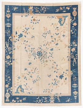 A semi-antique China/Nepal carpet, c, 385 x 297 cm.