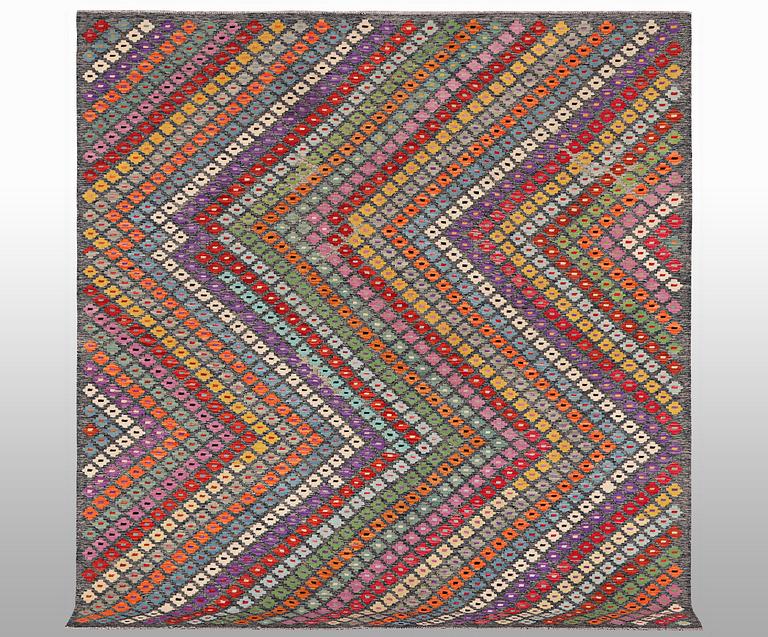 A carpet, kilim, ca 289 x 255 cm.